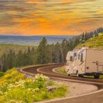 Recreational Vehicle driving down winding mountain road