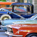 Classic cars parked along street
